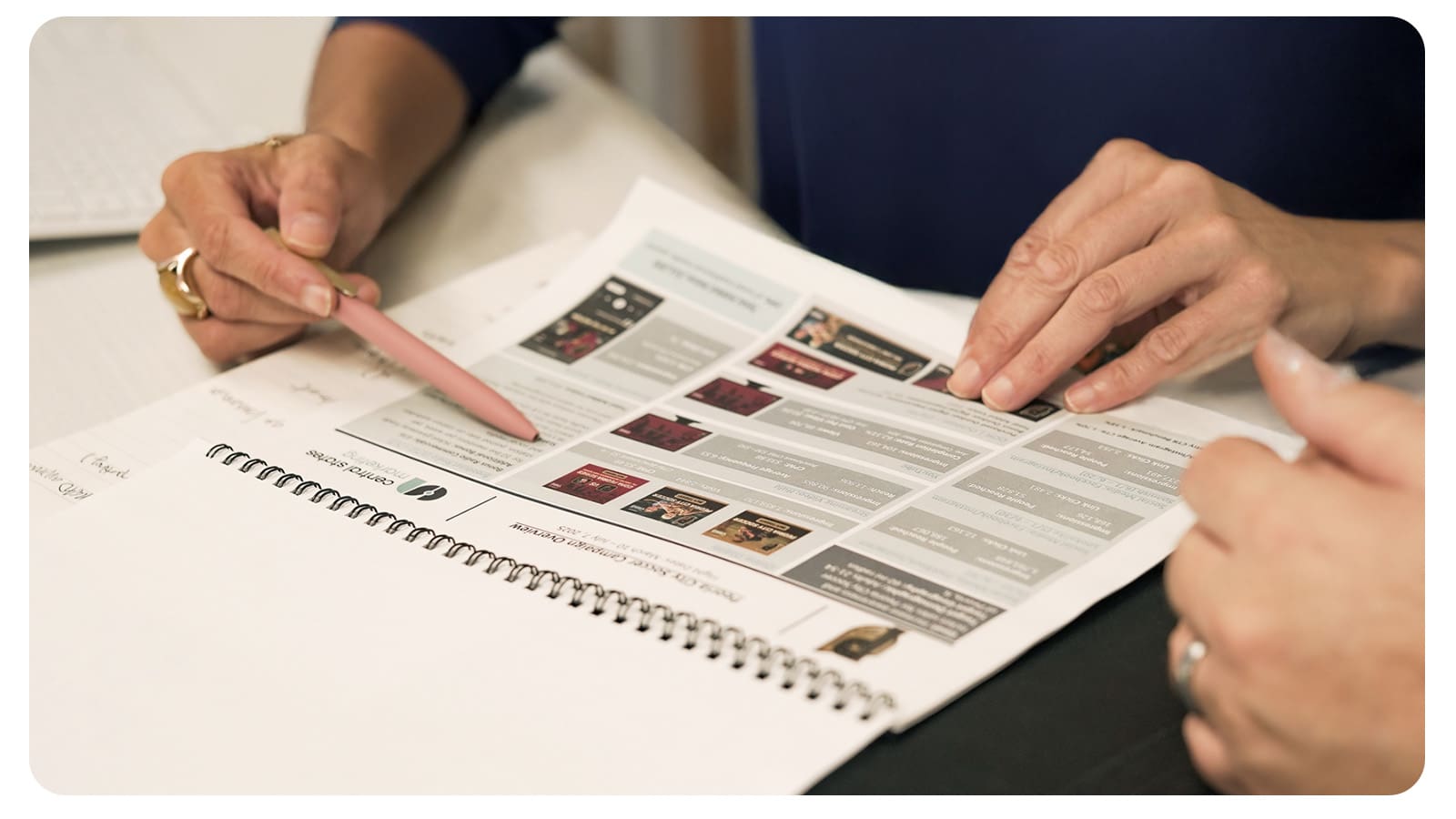 Analyst Strategically planning with charts and documents for marketing strategy in Peoria, IL